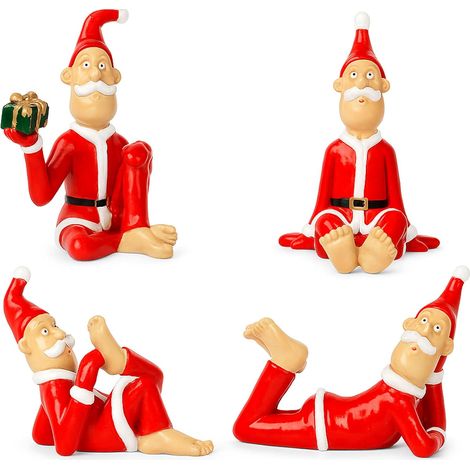 Quatre figurines de Père Noël - Sculptures et décorations de Noël sur le thème du Père Noël, statues décoratives rouges, décoration intérieure. (1/5)
