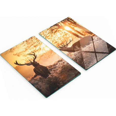 Tableros de vidrio con un dise帽o decorativo de un amanecer sobre un ciervo, 2x30x52 cm.