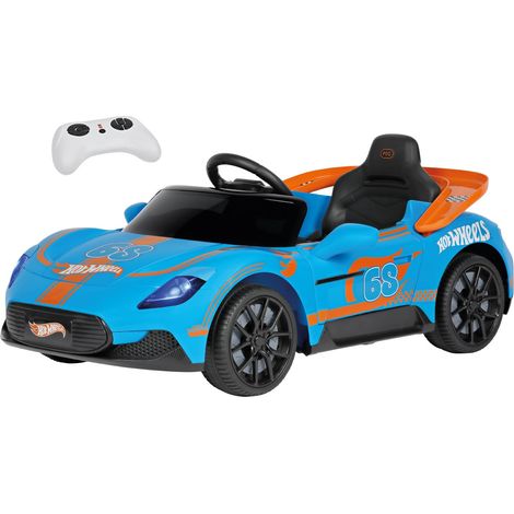 PEG Hot Wheels RC Auto Elettrica Cavalcabile 12V per Bambini con Telecomando, Guida Manuale, Pista Macchinine Integrata, Portiere Apribili, Luci e Suoni, Età 18+ Mesi (1/5)