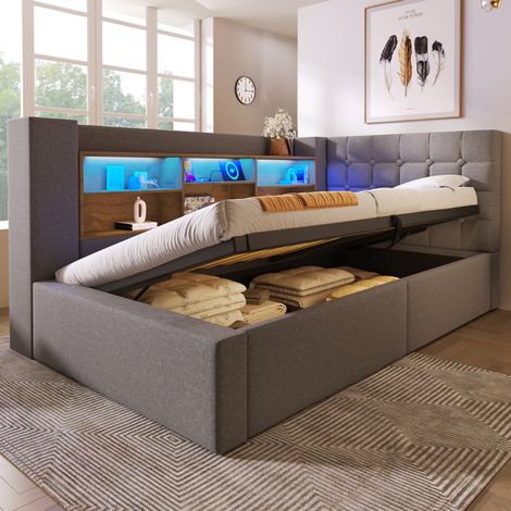 Cama tapizada moderna 90x200 cm en lino gris, con cabecero en L reversible, LED, puertos USB y almacenaje abatible (1/5)