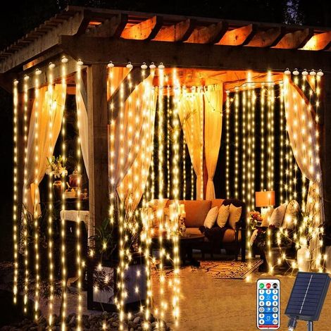 Rideau Lumineux Solaire Extérieur 3m x 3m 300LED Lumineuse Solaire avec Télécommande, 8 Modes Cascade Solaire d'extérieur étanche pour Jardin, Balcon, Tonnelle, Déco de Fête (1/5)