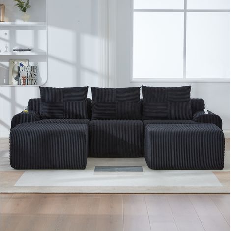Sofá modular 268/174 cm en negro de pana con portavasos y bolsillo lateral (1/5)