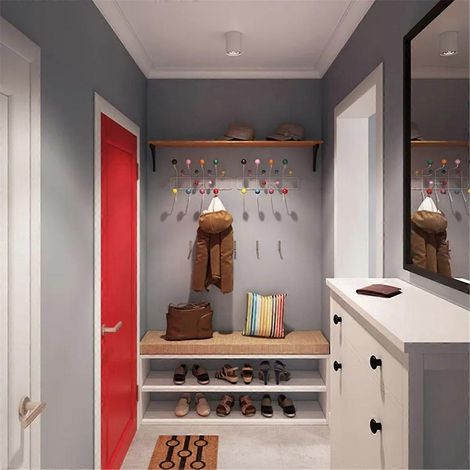 Einfache, an der Wand montierte Garderobe mit Haken und Kleiderbügel (1/5)