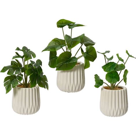 Piante foglie verdi finte in vaso decorato