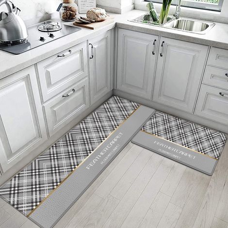 Thickened, long strip PVC oil-proof and stain-resistant floor mat, made of leather, suitable for kitchens, bathrooms, and toilets. Non-slip design. Black and white diamond pattern. 44150CM10MM