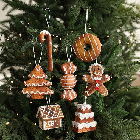 7-teiliges Set weihnachtlicher Hängedekorationen: Lebkuchenmann, Kuchen, Donuts, Rankenhaus, Süßigkeiten, Stöcke, Lebkuchenmann und Weihnachtsbaum. Dekorationen für eine stimmungsvolle Weihnachtsatmos