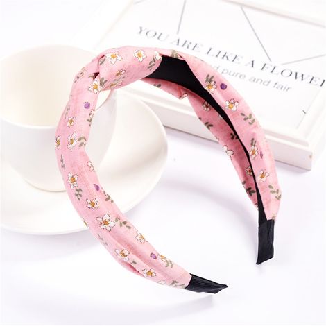 Accessoire de coiffure pour femme : serre-tête rond à pois et nœud en tissu (rose) (1/2)