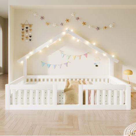 Hausbett 90/200 cm aus Holz in Weiß mit Rausfallschutz und LED-Lichterkette (1/5)