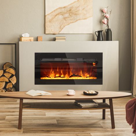 Chimenea eléctrica con soporte de pared y mando a distancia, leños artificiales y cristales, 1800 W de potencia, color negro. (1/5)
