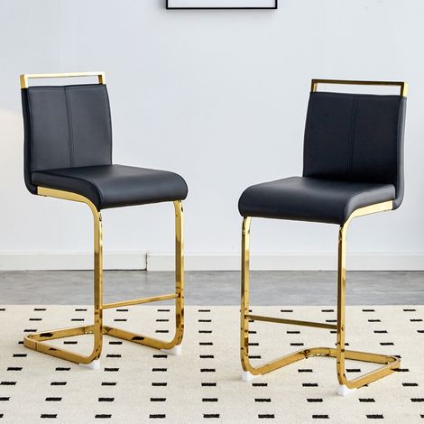 Lot de 2 tabourets de bar scandinaves noirs, assise en cuir synthétique premium, piètement métal laqué or, idéal pour comptoir, cuisine ou espace restauration. (1/5)