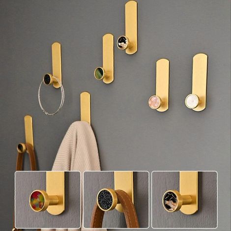 Crochet de suspension robuste et polyvalent, idéal pour les poignées de placard et les toilettes. Design compact. (1/4)