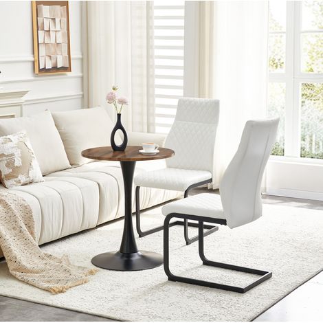 Set tavolo e 2 sedie rotondo 60 cm in MDF con sedie bianche in PU e metallo nero (1/5)