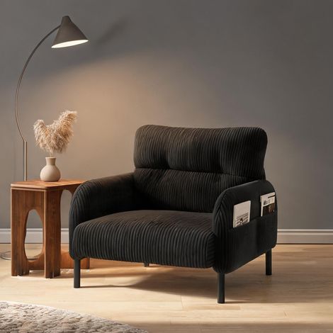 Fauteuil coloris noir en corduroy (1/5)