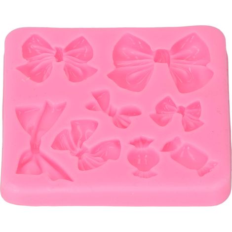 Moule en silicone souple, sûr et inodore pour la cuisson de gâteaux, fondants, chocolats et desserts faits maison. (1/5)