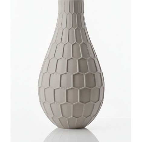Vaso decorativo geometrico grigio con un elegante motivo esagonale.