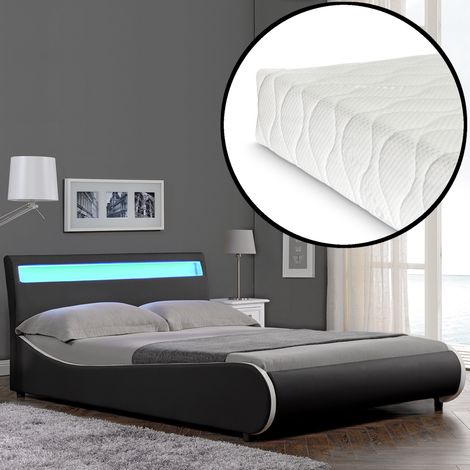 Lit capitonné à LED de Corium 'Valencia' avec matelas (180x200cm)(noir)(mousse froide) - avec cuir synthétique / housse en cuir synthétique / éclairage RVB / avec sommier à lattes / (1/5)