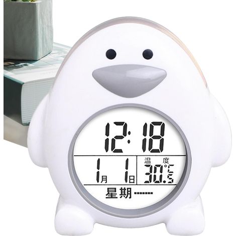 Reloj despertador digital con forma de pingüino: temperatura, calendario, temporizador y luz. Un gadget para estudiantes: divertido y funcional.