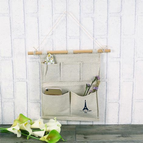 Pochette de rangement décorative en lin à 5 poches pour porte ou mur, idéale pour ranger vos petits objets. (1/4)