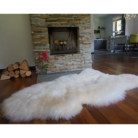 Alfombra de piel de oveja color crema natural - Lana larga, piel suave y esponjosa para decoración del hogar 50x30 pulgadas (1/5)