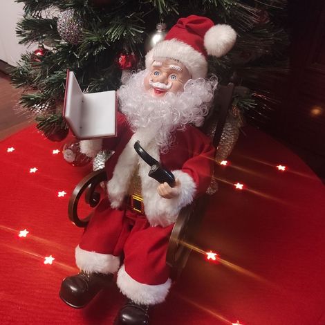 Babbo Natale con sedia a dondolo animata e luci a fibra ottica