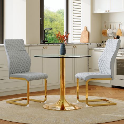 Ensemble table verre 85cm – Pieds dorés – 2 chaises gris clair/dorées – Style luxueux (1/5)