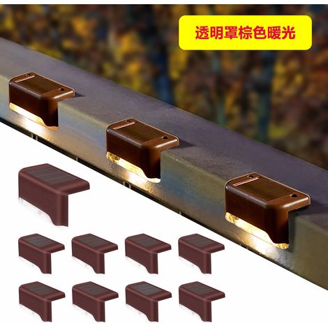 Lámpara solar de jardín para iluminar escaleras, vallas y barandillas. Aplique LED decorativo para exteriores, ideal para patios o jardines. Carcasa marrón, luz cálida, cubierta transparente. (1/5)