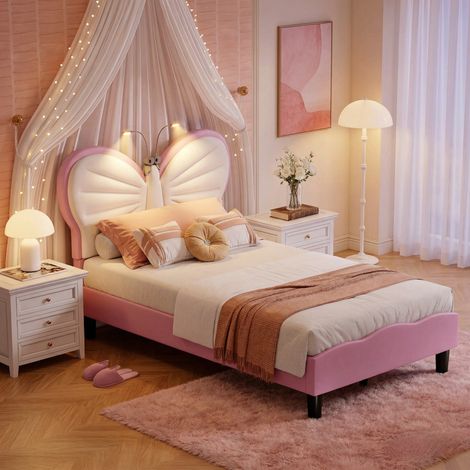 Letto per bambina 90x190 cm con testiera a farfalla, letto singolo in velluto rosa, rete a doghe, letto imbottito per cameretta