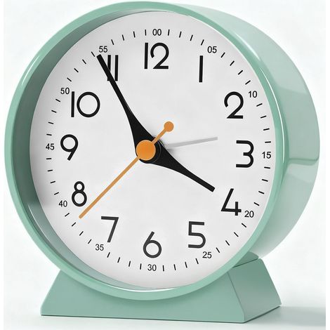 Este despertador analógico es silencioso y compacto, lo que lo hace ideal para decorar tu sala de estar, dormitorio o mesita de noche. (1/4)