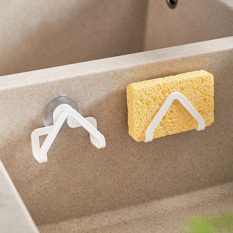 Porte-éponges de cuisine en 2 pièces avec ventouse. Fixez-le à tout évier en acier inoxydable ou en céramique pour ranger vos éponges proprement et garder votre plan de travail dégagé.