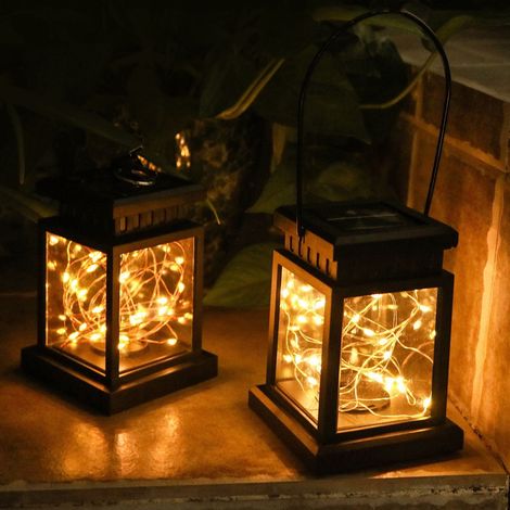 Lanterne Solaire - Suspension à Lumières LED - Décoration Intérieure Extérieure - Camping - 8 à 10 Heures d'Autonomie - 9 x 9 x 14 cm - ABS - Crochet Métallique - 1 Pièce (1/5)