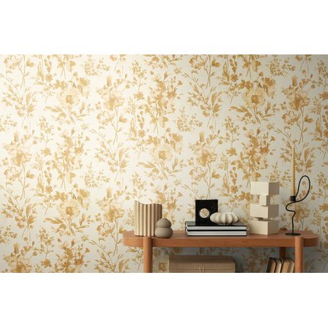 Papier peint intissé fleuri aux tons crème, or et blanc - 10,05 x 0,53 m - collection Cosmopolitan (1/5)