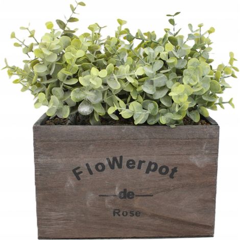 Planta artificial en una caja de madera: decoración rústica para interiores. (1/5)