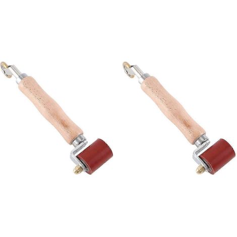 Deux rouleaux à joints en silicone de 40 mm avec rouleaux de détail en laiton de 6 mm, compatibles avec le ruban de toiture monocouche PVC/EPDM A SP. (1/5)