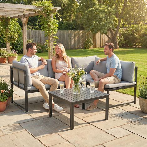 Ensemble de jardin 3 pièces comprenant un canapé d'angle 4 places et une table basse à lattes, en métal et polyester gris (1/5)