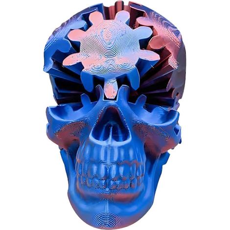Ce jouet représentant un crâne blanc et un engrenage est parfait pour être exposé sur un bureau, avec des accents rouges et violets. (1/5)
