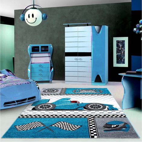 Tapis enfant bleu 80x150 cm en polypropylène – Motif uni – Adapté au chauffage au sol – Poids 2.500 g/m² – Fabrication mécanique – Allotapis (1/6)