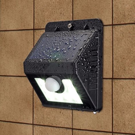 TRADE SHOP - Faro 8 Led Con Pannello Solare Ricaricabile E Sensore Di Movimento Per Esterno - (1/5)