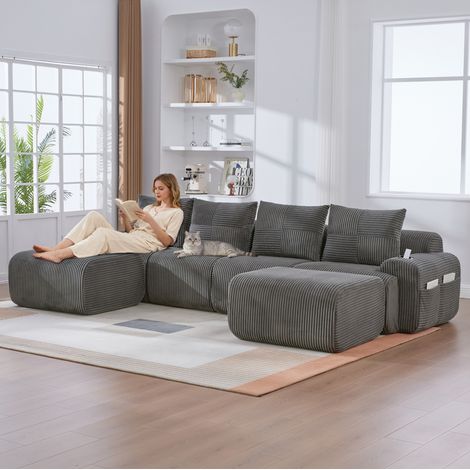 REDOM - Divano modulare 4 posti 333x174x80 cm, con 2 pouf, portabicchieri integrato, tasca laterale, velluto a coste grigio scuro (1/5)