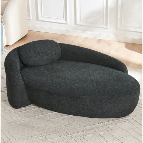 Sofa schwarz aus Lammfell-Optik mit Schaumstoffpolsterung, abgerundetem Design und Kissen (1/5)