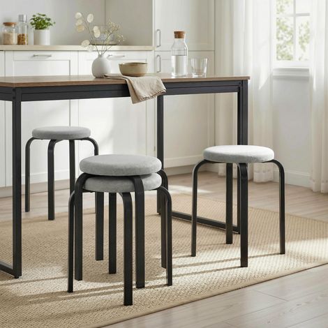 Ensemble de 4 tabourets ronds empilables modernes avec coussins. Gris