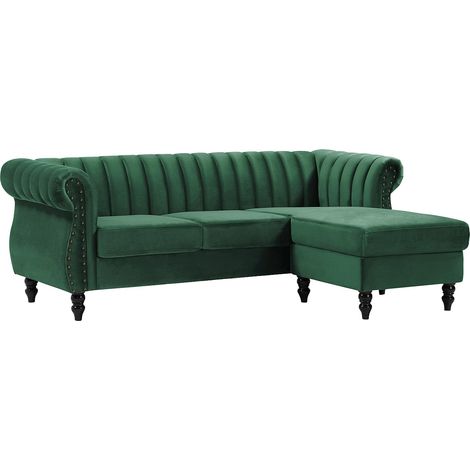 Vente-Unique – Canapé d'angle réversible 4 places en velours vert sapin – Structure en bois – Dossier matelassé – Garnissage mousse polyuréthane (1/4)