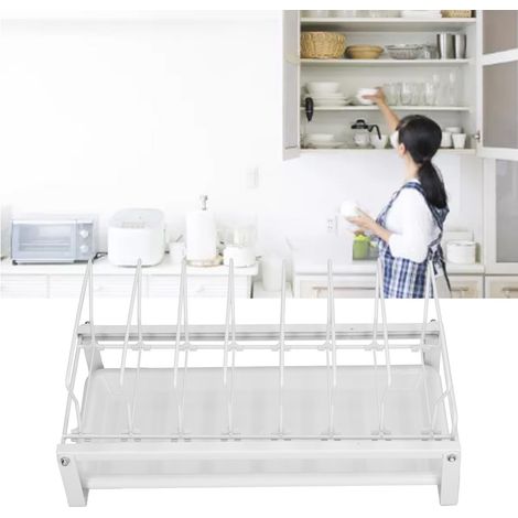 Égouttoir à vaisselle blanc intégré à un placard de cuisine, avec système coulissant pour ranger la vaisselle et les assiettes. (1/5)