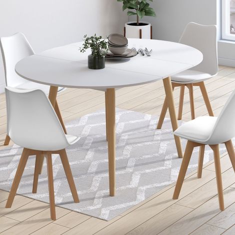 Mesa de comedor redonda extensible ANGELA blanca con patas de madera 110 - 150 cm y juego de 4 sillas SARA blancas