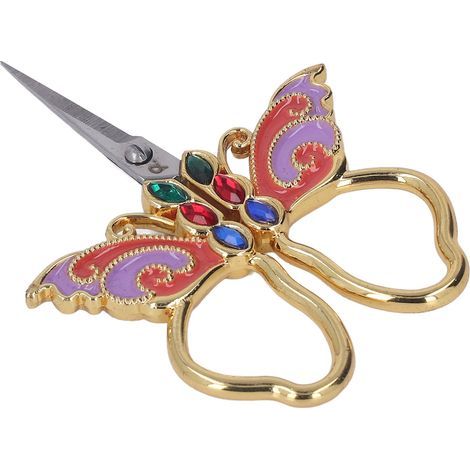Ciseaux à broder vintage en forme de papillon pour couture et tricot, légers et portatifs.