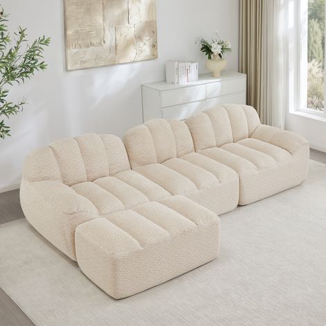 Canapé d'angle modulare 3 posti in fleece granulato beige bianco con ottoman, senza struttura e seduta profonda (1/5)