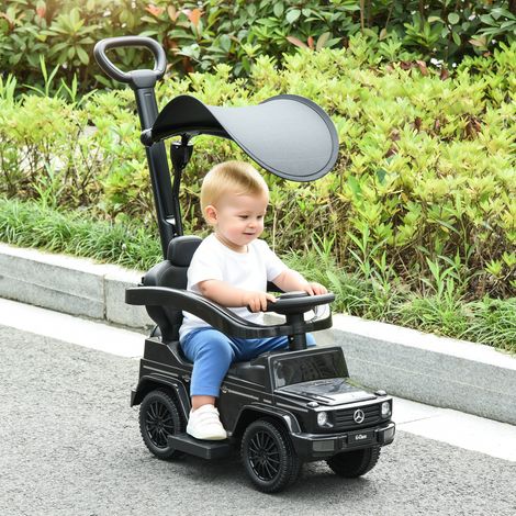 Voiture électrique pour enfants, entièrement équipée, 12-36 mois, avec klaxon, repose-pieds, barres de sécurité et pare-soleil, noire (1/5)