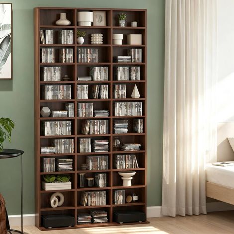 Estantería de almacenamiento (102x23.5x195 cm), con 36 compartimentos regulables, para CDs y DVDs, MDF marrón (1/5)