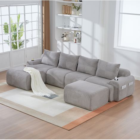 Sofá modular de 4 plazas de pana gris claro, 333x174x80 cm, con portavasos integrado y bolsillo lateral (1/3)