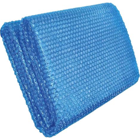 La couverture solaire bleue pour piscine recouvre les tissus couleur crme (1/5)