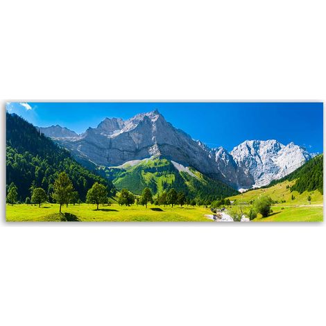 Tableau panoramique alpages lumineux et sommets alpins ciel bleu (1/5)